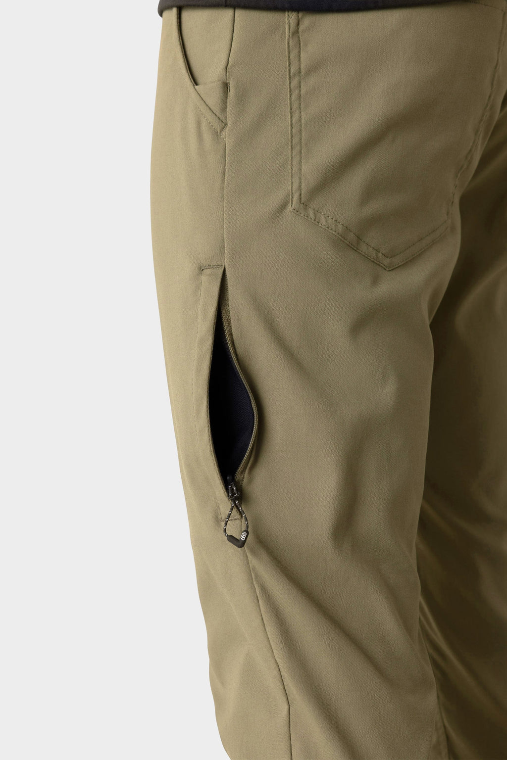 A close-up of the 686 Everywhere® Merino-Lined Pant - Slim Fit pocket, designed by 686 to keep your hands warm and dry even in cold weather.