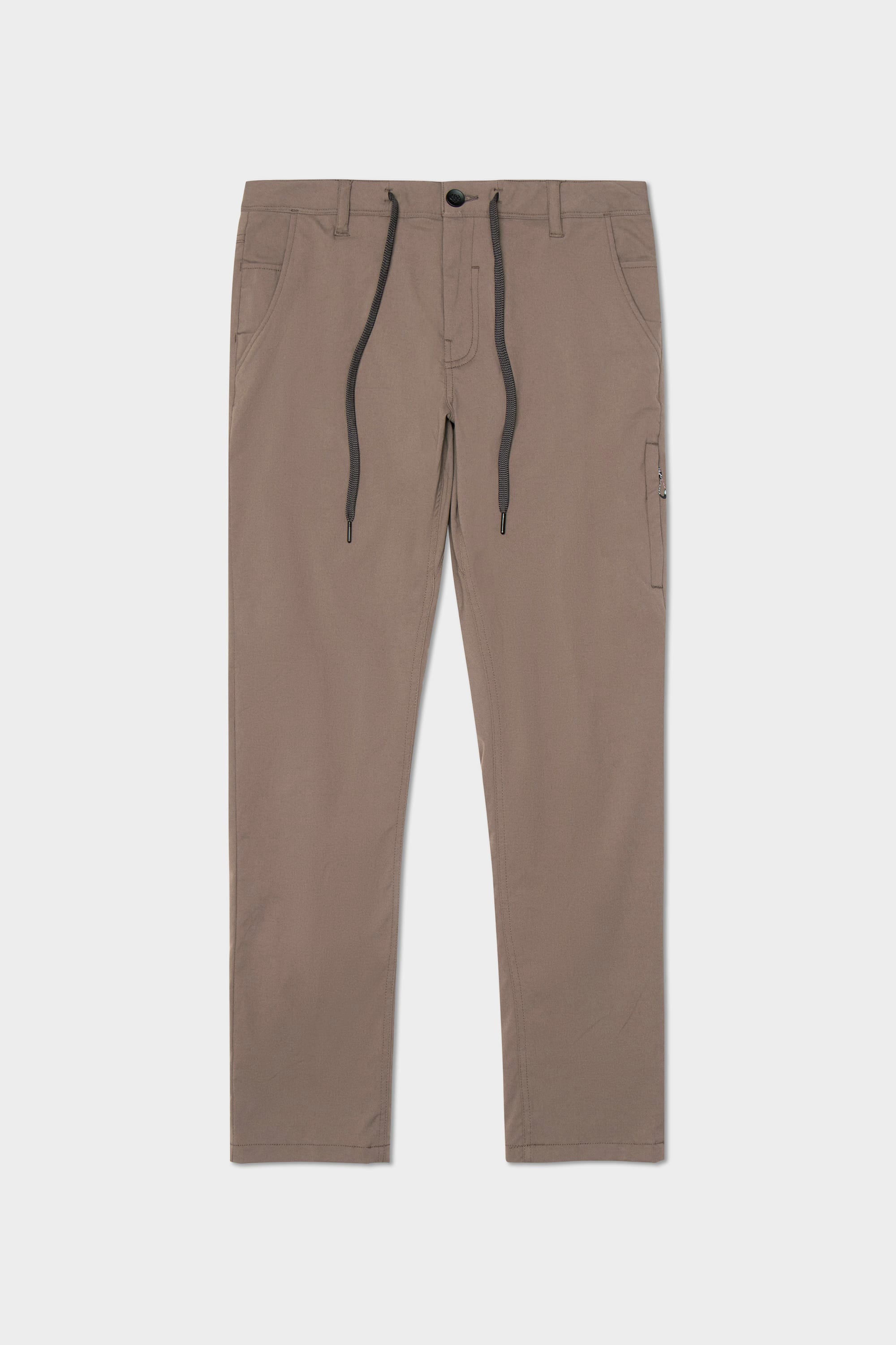 The 686 Men's Everywhere® Merino-Lined Pant - Relaxed Fit features a taupe color, straight-leg cut, black drawstrings, belt loops, front and side pockets, and a button closure. Shown laid flat on a white background. Ideal for pairing with winter outerwear.