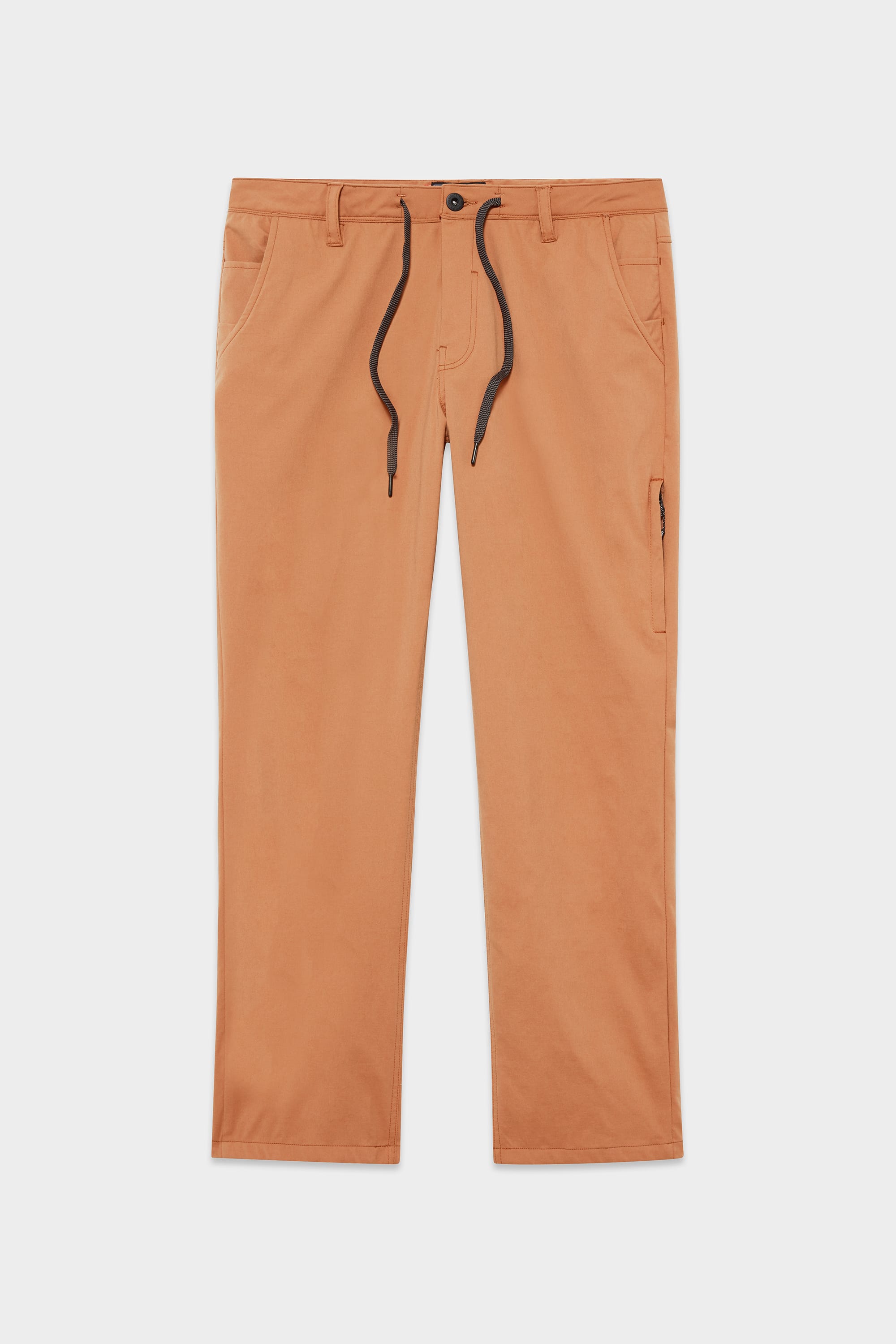 The 686 Men's Everywhere® Merino-Lined Pant - Relaxed Fit features a tan straight-leg style with a black drawstring, button and zip closure, belt loops, and side pockets—ideal for chilly days and styled here laid flat on a white background.