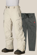 The 686 Men's SMARTY® 3-in-1 Cargo Pant is displayed with black boots and alongside gray fleece pants featuring a drawstring waist and removable sweatpant liner, offering three ways to wear—all set against a plain backdrop.