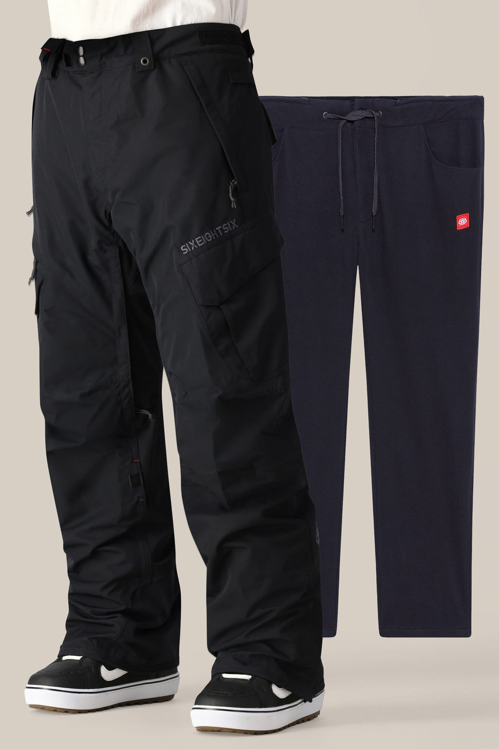 Two pairs of pants: the 686 Men's SMARTY® 3-in-1 Cargo Pant in black, loose with visible zippers, styled three ways with black-and-white sneakers; and a dark blue straight-leg pair featuring a drawstring waist and red logo patch, shown flat.