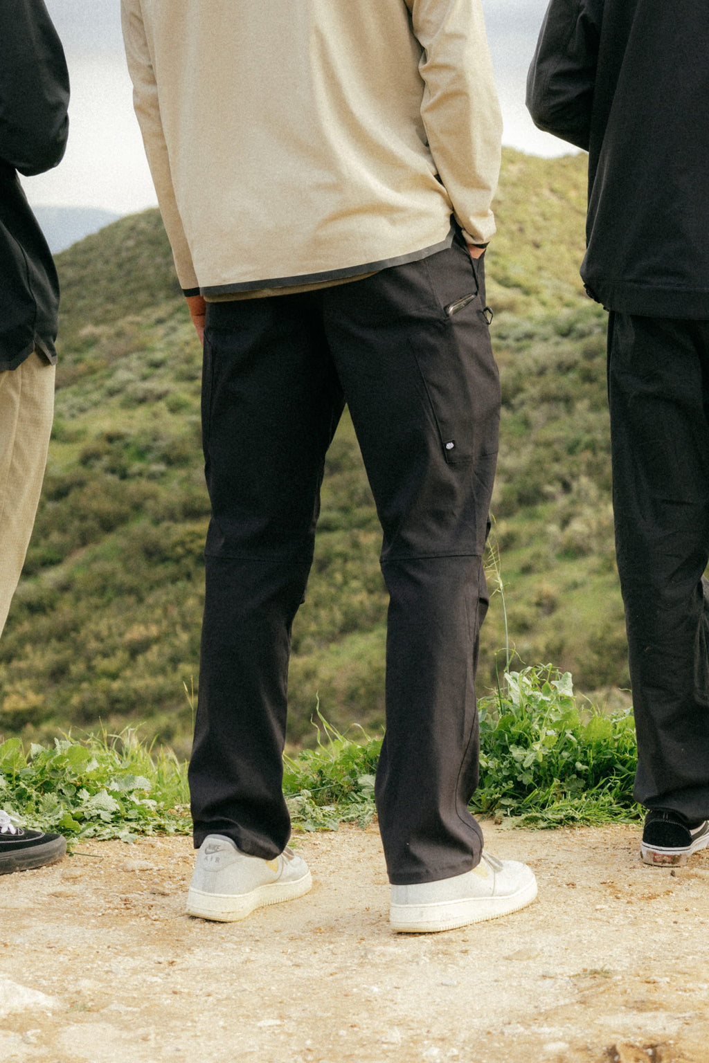A person's legs in the 686 Anything Cargo Pant - Relaxed Fit highlight the comfort and style offered by 686.
