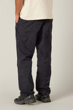 A person wearing 686 Everywhere® Pant - Relaxed Fit by 686 in black.