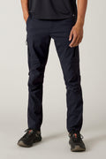 A person wearing black athletic shoes, a black shirt, and 686 Men's Anything Cargo Pant - Slim Fit by 686 with a 13-pocket design stands against a light background; only their lower half is visible—ready for any adventure.
