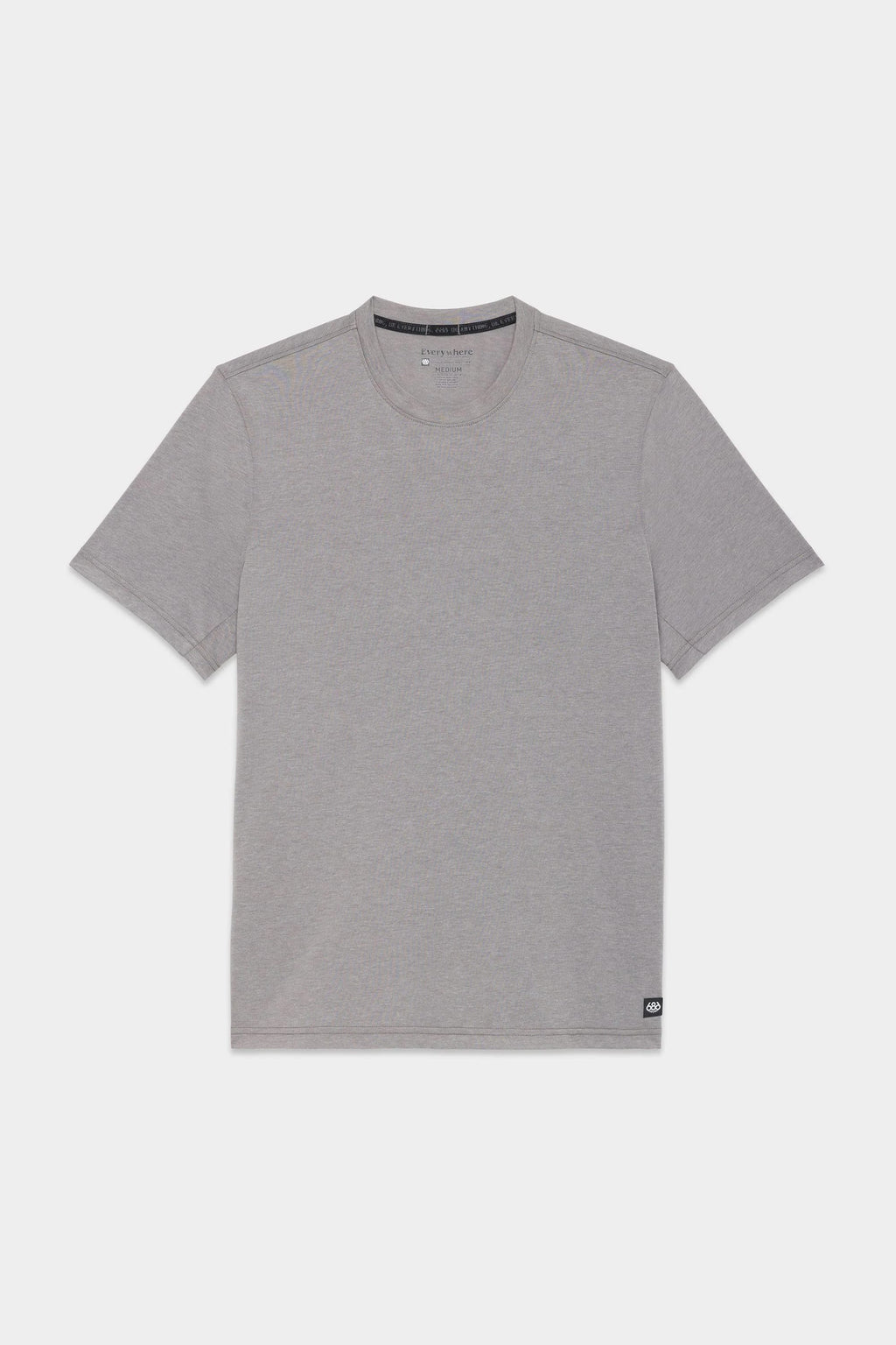 The 686 Mens Everywhere drirelease® Tech Tee by 686 is a plain, short-sleeved, light gray crew neck t-shirt, shown laid flat on a white background.