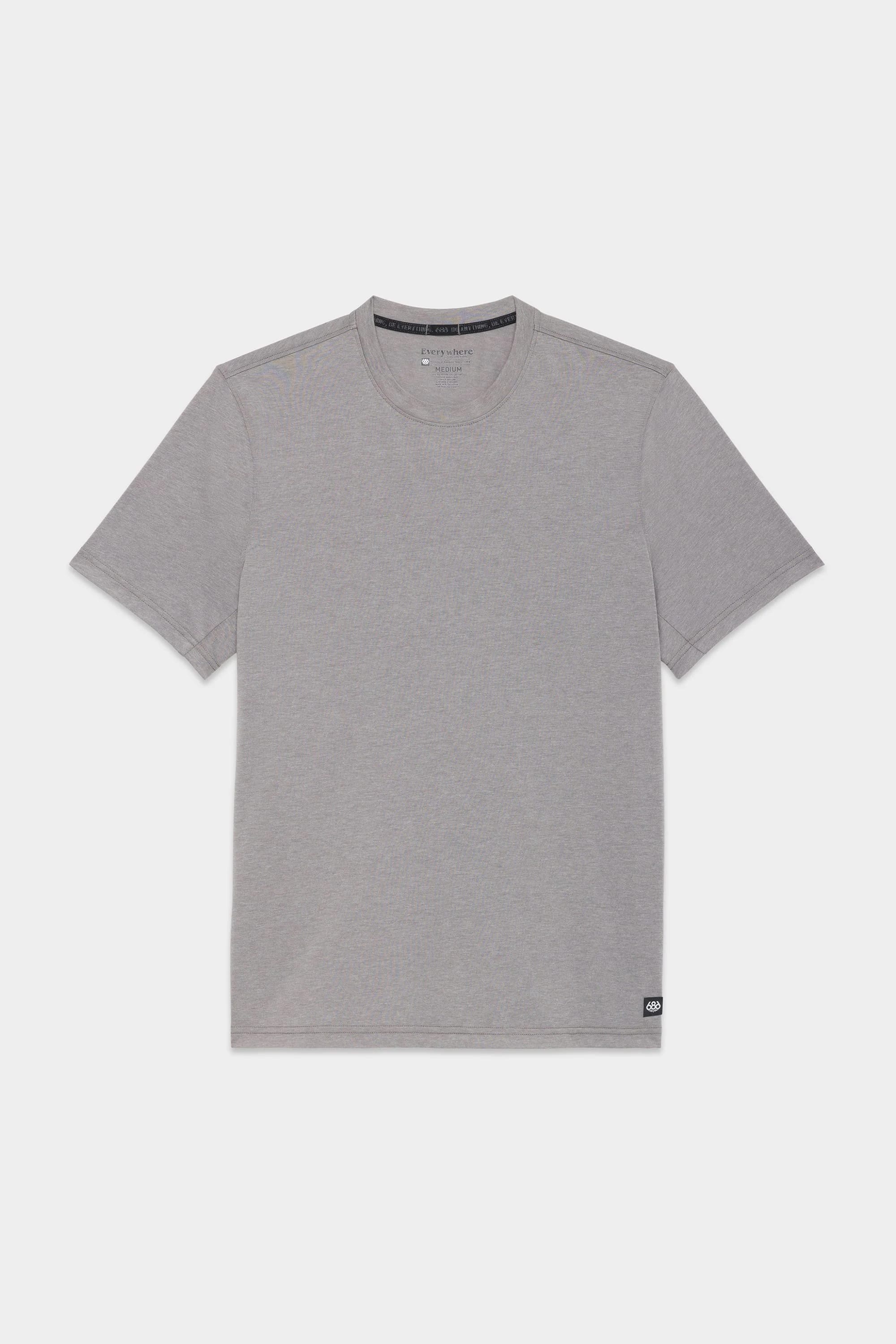 The 686 Mens Everywhere drirelease® Tech Tee by 686 is a plain, short-sleeved, light gray crew neck t-shirt, shown laid flat on a white background.