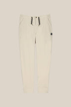 The 686 Women's SMARTY® 3-in-1 Cargo Pant features ribbed cuffs, two side pockets, a drawstring waistband with black ties, three ways to wear, and a small black logo tag on the right pocket. Shown against a light beige background.