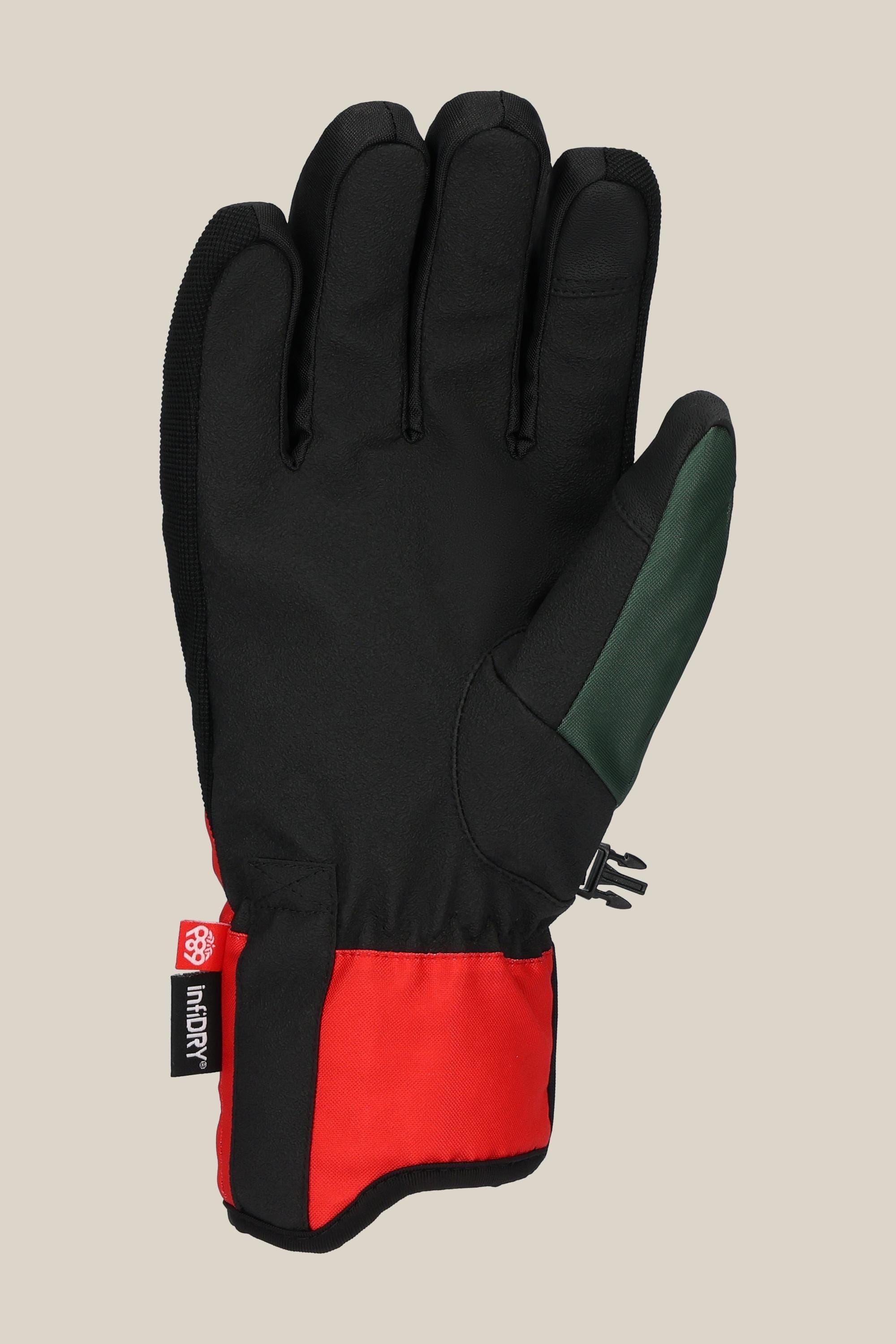 The 686 Mens Primer Glove by 686 is shown palm up on a beige background, featuring a red-accented cuff, green thumb patch, small logo tag at the wrist, and a reinforced palm design.