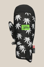 The 686 Mens Primer Mitt features a black design with white marijuana leaf patterns, a green rectangular 686 logo patch, adjustable wrist strap, small red inory tag, and reinforced palm for durability on the slopes.