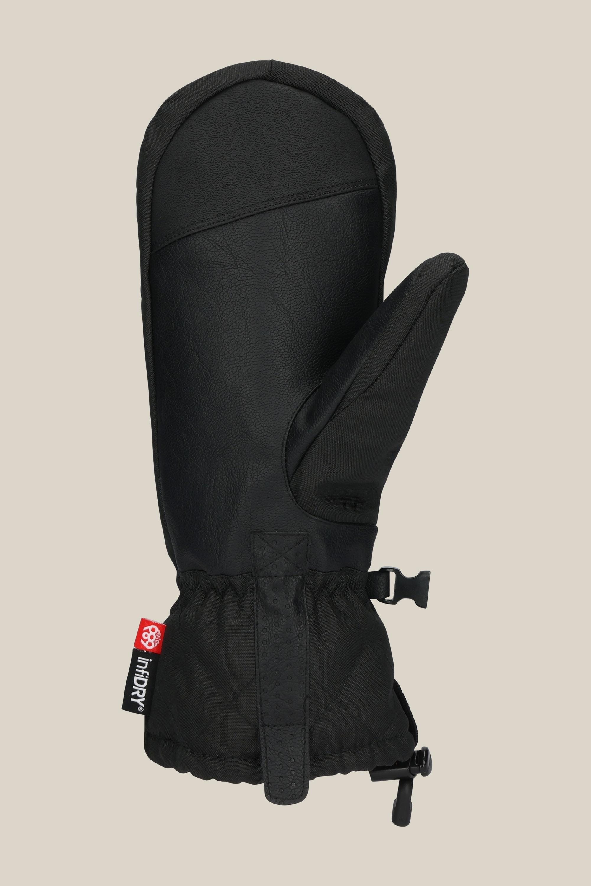The 686 Women's Jubilee™ Mitt by 686 is a black waterproof mitt with light insulation, textured surface, elastic wrist, adjustable strap, and a small red and white side tag, shown on a plain beige background.
