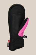 The 686 Womens Revel Mitt by 686 is a black insulated mitt with a bright pink thumb, adjustable wrist strap, black clip, and a red and white fabric tag near the wrist. Shown against a light beige background.