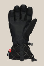 The 686 Women's Jubilee™ Glove by 686 features a black leather palm, quilted wrist, adjustable strap, and red branded tag, displayed on a plain beige background.