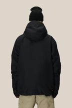 A person is shown from the back against a beige background wearing the 686 Men's Hydra™ Thermagraph® Jacket, black gloves, a black beanie, and light-colored pants.