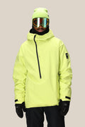 A person wearing the 686 Mens GORE-TEX Fragment Shell Anorak in neon yellow, black gloves, black snow pants, a neon yellow beanie, and reflective ski goggles stands facing forward against a plain light background.