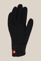 The 686 Mens Merino Glove Liner by 686 is shown in black with a textured cuff and a small red tag near the wrist, palm up on a plain beige background.