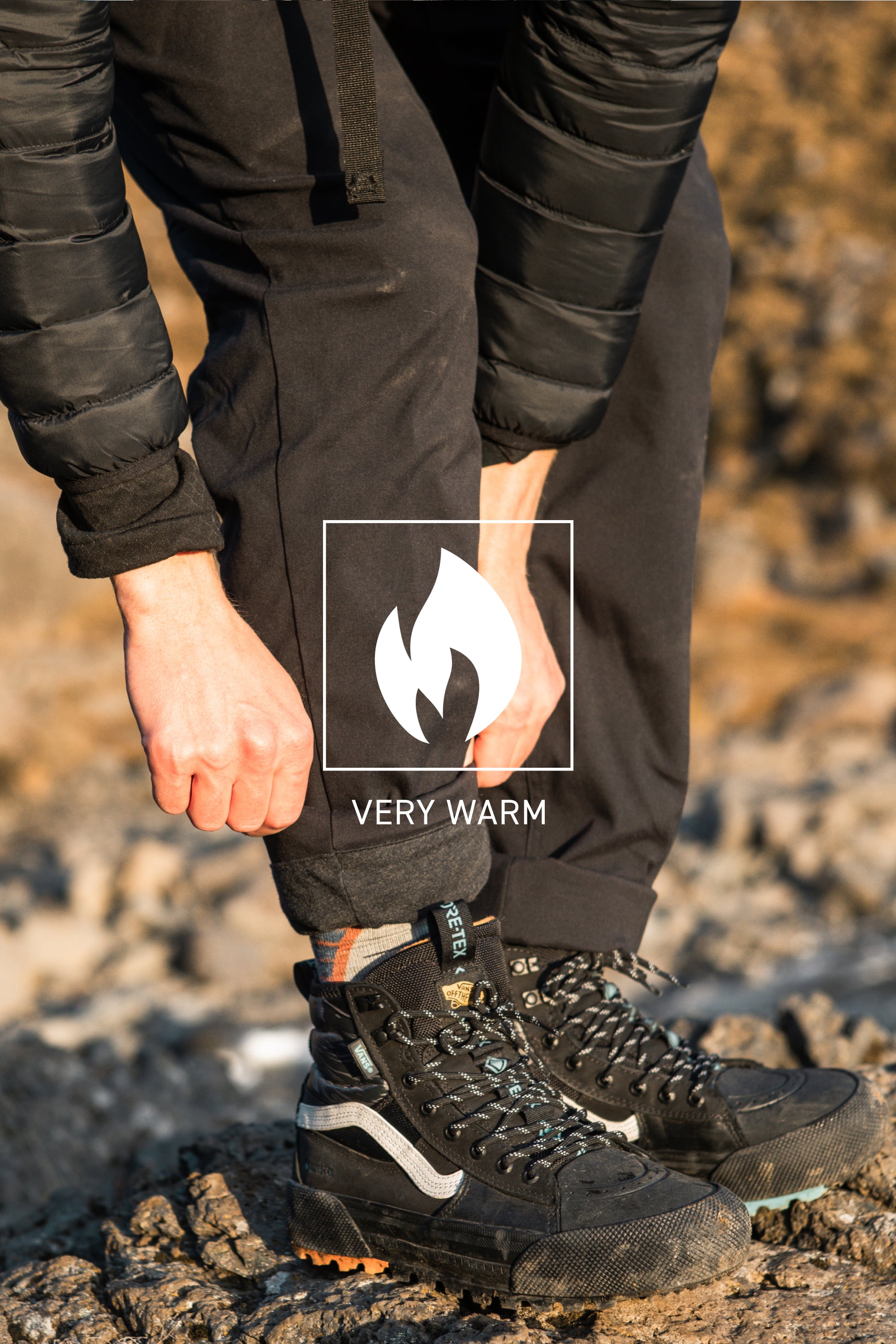 Someone wearing the 686 Everywhere® Merino-Lined Pant - Relaxed Fit by 686, staying dry and warm in colder conditions.